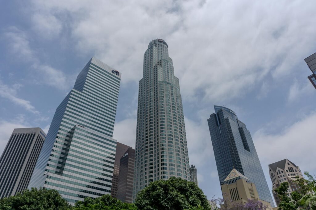 The US Companies Owning the Largest Warehouse Space Visualized with Manhattan Island for Scale Comparison